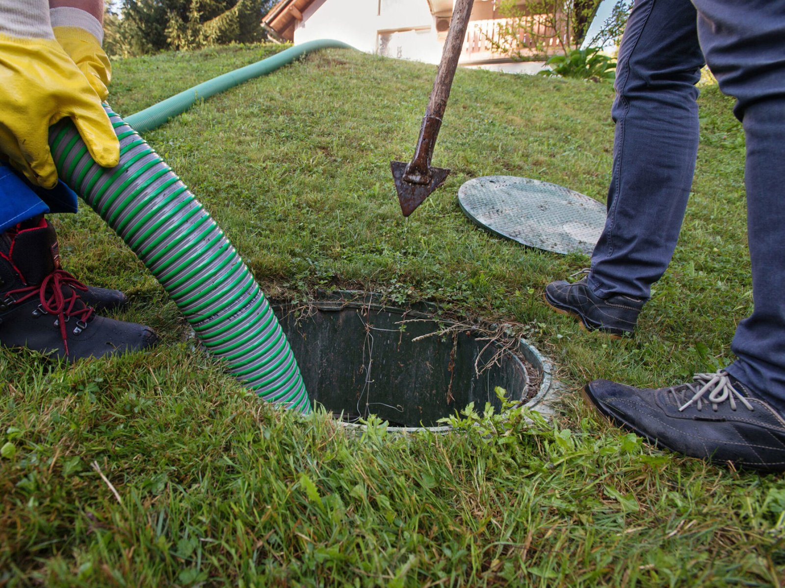 emptying-septic-tank-backyard-109025849